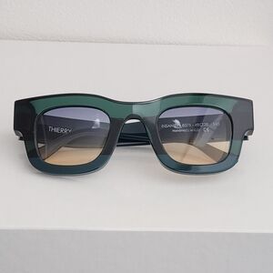 Thierry Lasry Green and Black Glasses